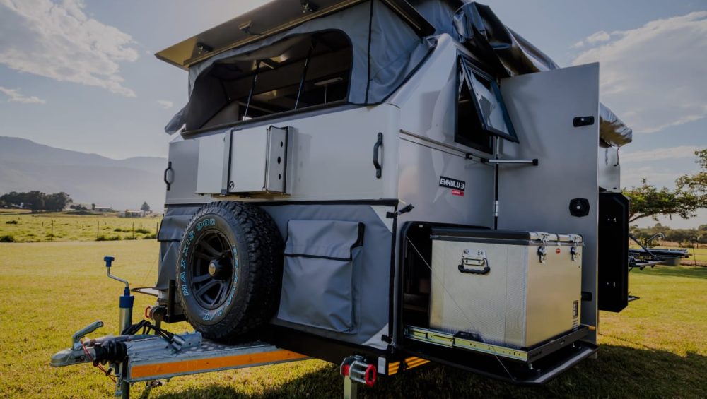 Close up front Photo of the Infanta 4x4 Enkulu 3 with door open on a field